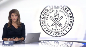 Woman in black dress sits at desk with a silver laptop computer open in front of her. Logo of the Chicago teachers Union displayed behind her left shoulder.